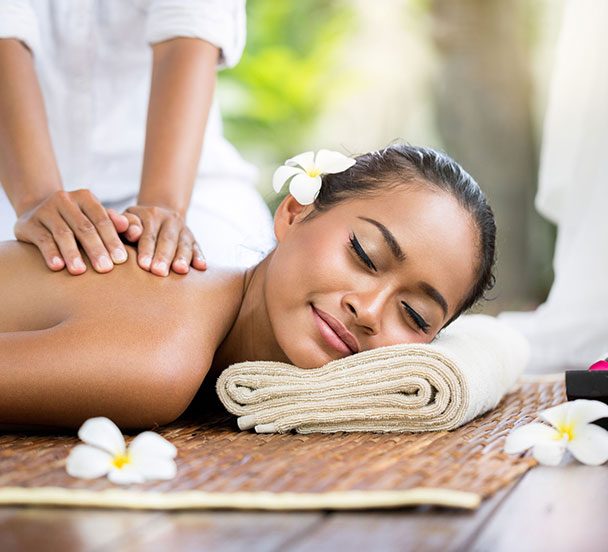 Woman enjoying a Thai massage.