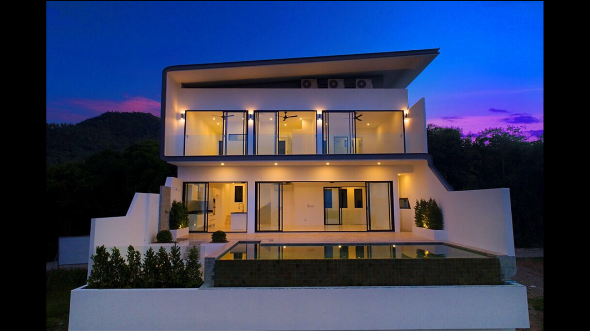 Modern 3-bedroom villa during sunset, Koh Samui.