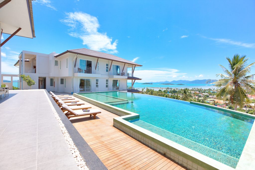 Communal pool with stunning sea views