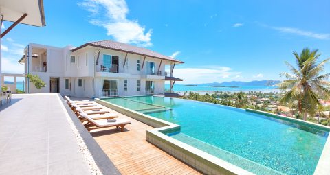 Communal pool with stunning sea views