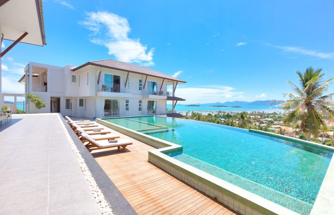 Communal pool with stunning sea views