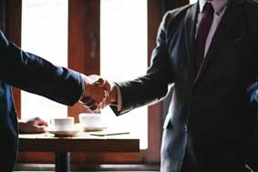 Businessmen shaking hands.