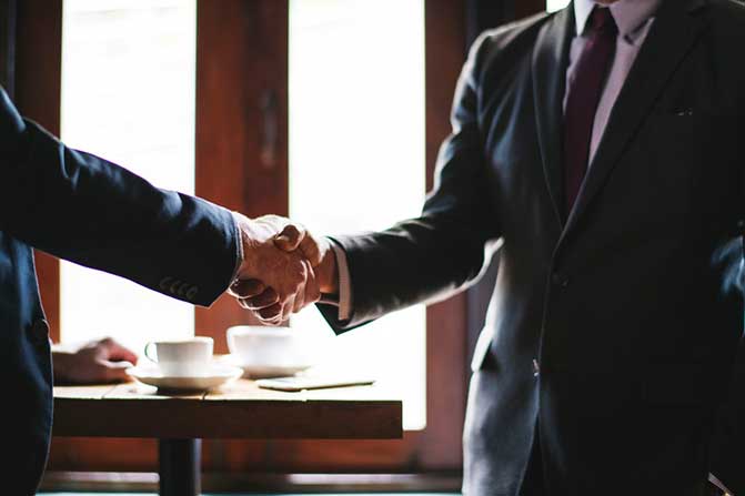 Businessmen shaking hands.