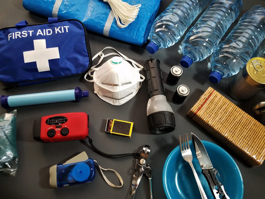 Emergency preparedness kit with first aid and survival supplies