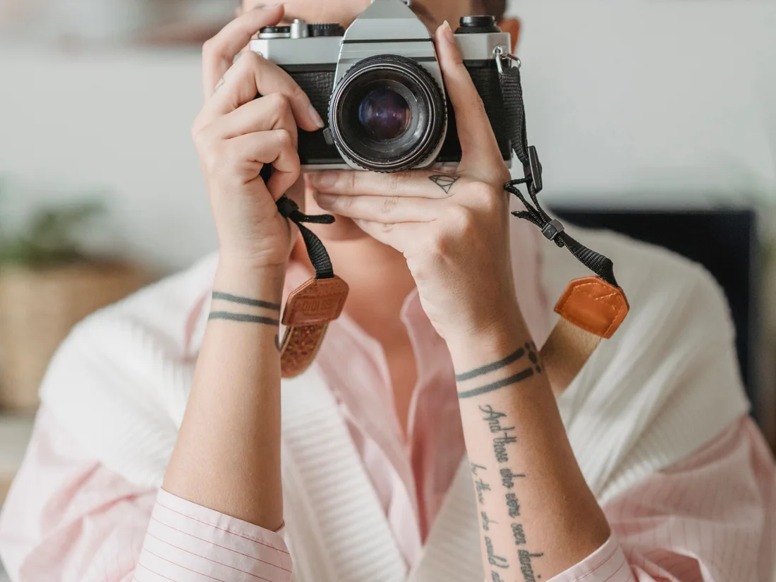 Photographer capturing professional photos of a rental property interior in Koh Samui