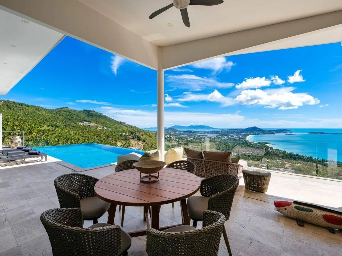 Hillside villa terrace and pool overlooking the coastline on Koh Samui