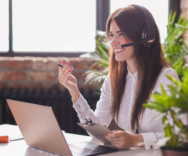 Woman working in call center as dispatcher